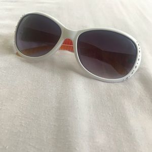 White sunglasses and ombré of color on the arm